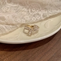 Golden bow ring with pearls and rhinestones on white vintage relief plate - Style 24# Ring