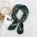 Elegant dark green silk scarf with classic white polka dots in a stylish knotted fold - Green Double Row Dot Frame