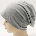 Unisex light grey slouchy knit beanie hat for winter casual wear on head mannequin - Adjustable / Light Gray