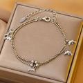 Silver double-layer stainless steel anklet with delicate dolphin charms on box - Stainless Steel Silver Five Dolphins Anklet (10852)