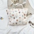 Beige quilted makeup bag with cute cartoon bear print and stylish quilted fabric texture - Goodnight Bear