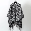 Retro leopard print knitted shawl in black and grey with stylish tassel fringe detail - Black and White