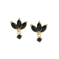 Detailed close-up of leaf-shaped gold drop earrings with black marquise cut gemstones - Black Gold