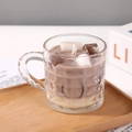 Vertical striped glass candle holder with coffee-colored scented wax and ice decor - Style 3