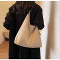 Minimalist beige faux suede oversized tote bag worn as a shoulder bag on black coat - Shoulder Bag Set / Off White