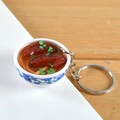 Miniature blue and white porcelain bowl keychain featuring realistic braised pork noodles - Chicken Wing Noodles
