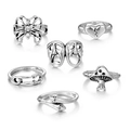 Retro silver ring set featuring butterfly, heart, mask, and snake designs on white background - HS1089-2 Style
