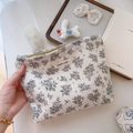 Detailed view of floral cotton makeup bag with purple flower patterns and simple wish label - Purple Floral Green Leaf Pattern on Beige