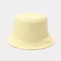 Solid bright yellow terry cloth bucket hat featuring a minimalist plush texture design - M (56-58cm) / Light Yellow