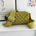 Detail of matcha green knitted pineapple bag showing waffle texture and gold metal buckle - Lemon Yellow