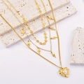 Collana dorata a strati con pendenti a fulmine e ciondolo a cuore in perla testurizzata - Oro Multistrato Fulmine Cuore (XL01775-1)