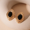 Orecchini ovali vintage in oro con inserto nero su espositore in pietra neutra - Stile Fiore Ovale Nero (Perno in Argento)