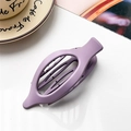 Detail of a large purple matte plastic hair claw clip on a stylish textured surface - Matte Purple Gray