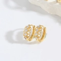 Chic gold-tone bow earrings featuring pavé cubic zirconia studs in a polished finish - Four Zirconias