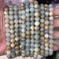 Natural gray-blue Phantom Quartz beads strings with unique earthy mineral textures - Natural Blue Calcite AB+