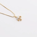 Golden umbrella necklace with white mother-of-pearl and zircon stones on white backdrop - Umbrella Mother Of Pearl Style