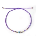 Bracciale bohémien viola intrecciato con ciondolo occhio del male e accenti dorati - Viola