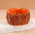 Wide block-style leopard print acrylic bracelet in translucent orange finish - Orange