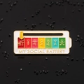 Rotating social battery enamel pin with colorful gradient slide on a textured stone background - Motion Battery Brooch / Social Motion - White
