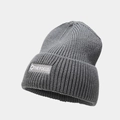 Detailed macro view of dark grey ribbed knit beanie featuring The Focus logo patch - One Size / Dark Gray