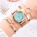 Detail of rose gold quartz watch with turquoise floral dial and matching bracelets - Cyan + Bracelet