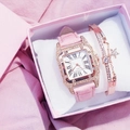 Detail of square quartz watch with pink leather strap and matching star charm bracelet - Pink Watch + Bracelet + Box
