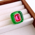 Macro view of vintage resin hexagon ring with ruby gemstone and sparkling diamond halo - Green - Rose Red
