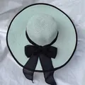 Cappello di paglia verde menta a tesa larga con bordo nero e grande fiocco decorativo - Taglia Unica (55-58cm) / Bordo Nero Verde