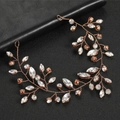 Macro detail of rose gold bridal hair vine with shimmering crystals and hand-woven wire - Rose Gold Hair Vine