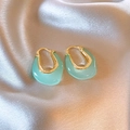 Vintage light green resin U-shaped hoop earrings with gold metal clasp on silk fabric - Blue