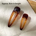 Pair of large 8cm amber tortoiseshell triangle hair clips with translucent resin texture - Large (2 Pieces/Pack) / Caramel Gradient