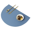 Blue semi-circle PU leather placemat with golden cutlery on a clean white background - Blue