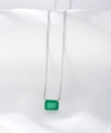 Macro detail of square emerald pendant on a fine silver chain with four-prong setting - 925 Silver / Silver