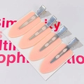 Set of 4 light pink seamless hair clips with plastic top and alloy base on card - Set of 4 / Pink