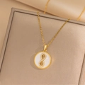 Collar dorado de lujo con colgante número 8 de circón sobre nácar y joyero elegante - Concha Dorada - Símbolo de Infinito Hueco