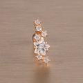 Macro detail of rose gold cartilage earring featuring a star design with clear zircons - 6# Star Shape / Rose Gold
