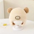 Beige baby winter knit hat with brown double pompoms and m-patch earflaps - Letter M - Beige