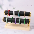 Double-tier gold metal and wood jewelry display stand for bracelets and watches - 2-Tier Black Leather