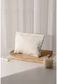 Close-up of white corduroy cosmetic bag on wooden tray with lipstick and candle accessories - White