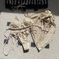 Beige three-piece bikini set with textured wavy fabric and matching tie sarong - S / Off White
