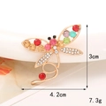 Macro shot of dragonfly charm with colorful rhinestones and size details 4.2x3cm - Multicolor Long Tail Dragonfly