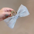 Detail of light blue mesh fabric bow hair claw clip with beads for French hairstyle - Iridescent Bow Grey
