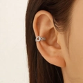 Minimalist silver ear cuff featuring heart shape with zircons shown on model ear - Rose Gold Heart Zircon Style (G-179)