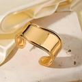 Polished wide gold-tone open metal cuff bracelet on smooth stone and cream silk background - Gold Narrow Mirror Polish Bracelet (D1527)