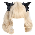 Close-up of black bat wing hair clips on long blonde wavy hair for Gothic Lolita style - Black Devil with Black Bow