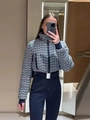 Detail of winter jumpsuit with houndstooth jacket, waist belt and navy trousers - S / Top And Bottom / Houndstooth