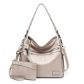 Close-up of pebble-textured tote bag and matching pouch set with gunmetal zippers - Two-Piece Set / Off-white