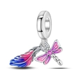 Macro view of dragonfly and gradient feather pendant with colorful enamel details - Dragonfly and Feather Double Charm