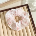 Floral lace scrunchie with pink bow and polka dot pattern on a white fabric base - Pink Bow Dots