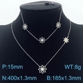 Silver stainless steel daisy jewelry set with necklace and bracelet featuring floral charms - Necklace & Bracelet Set / Steel